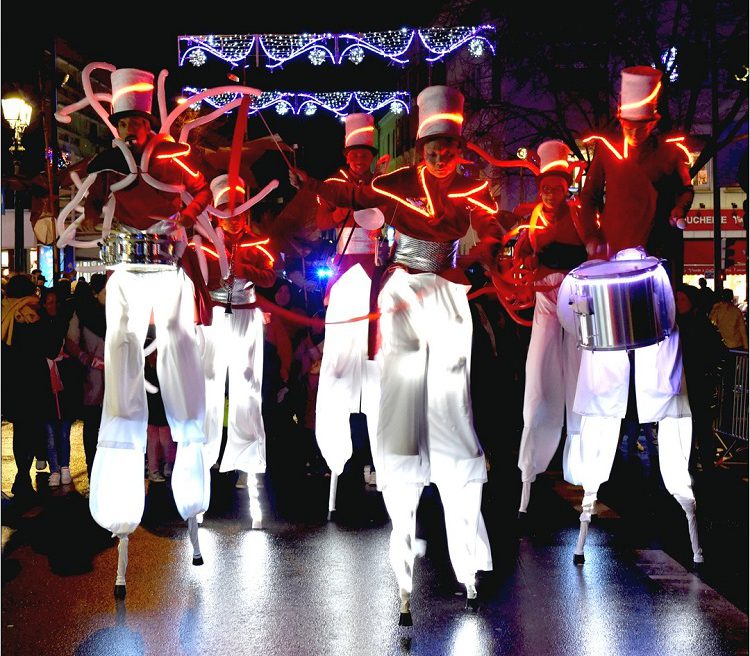 stilt walkers live music